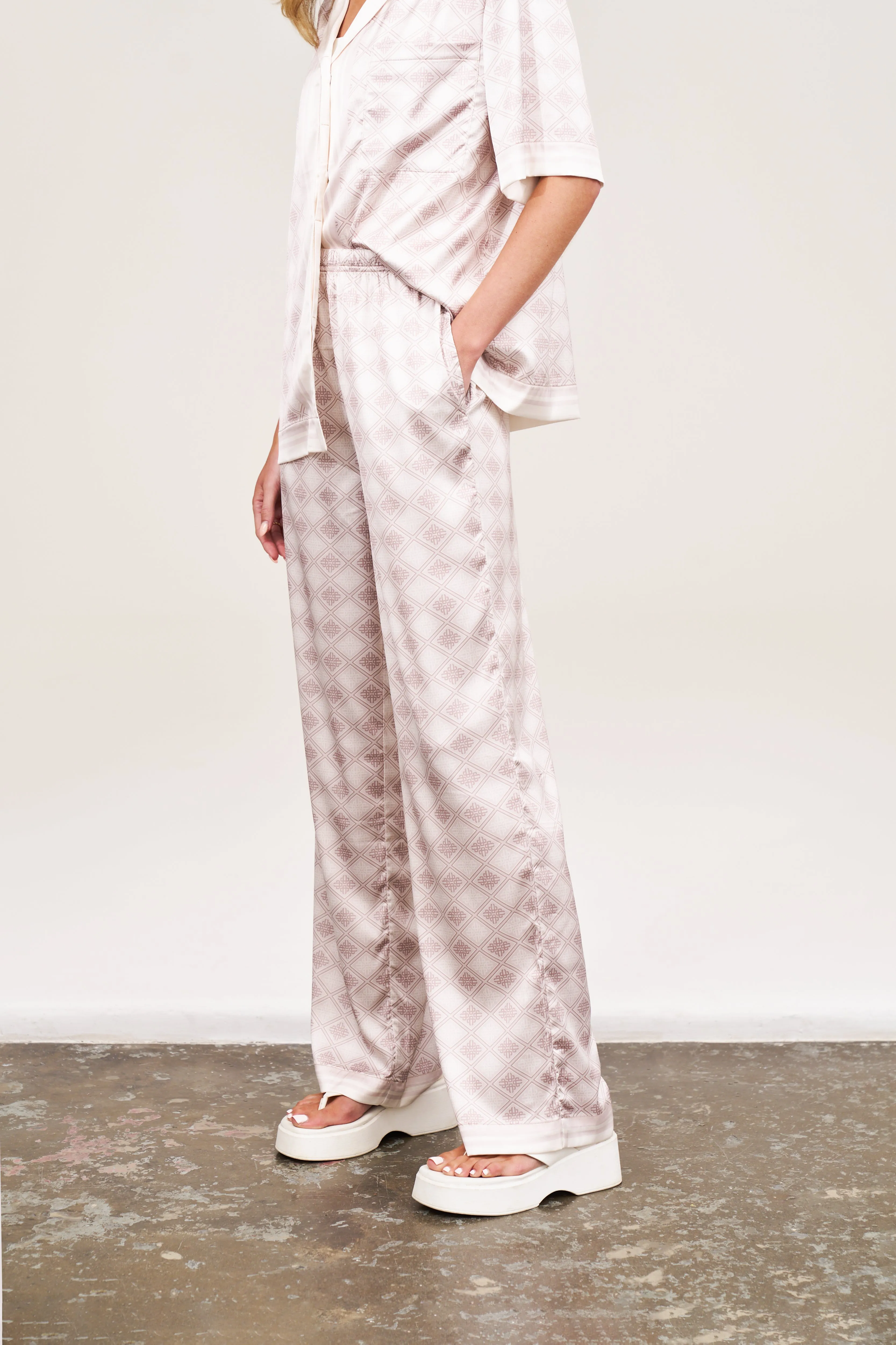 EMBLEM PRINT WIDE LEG TROUSERS - BEIGE