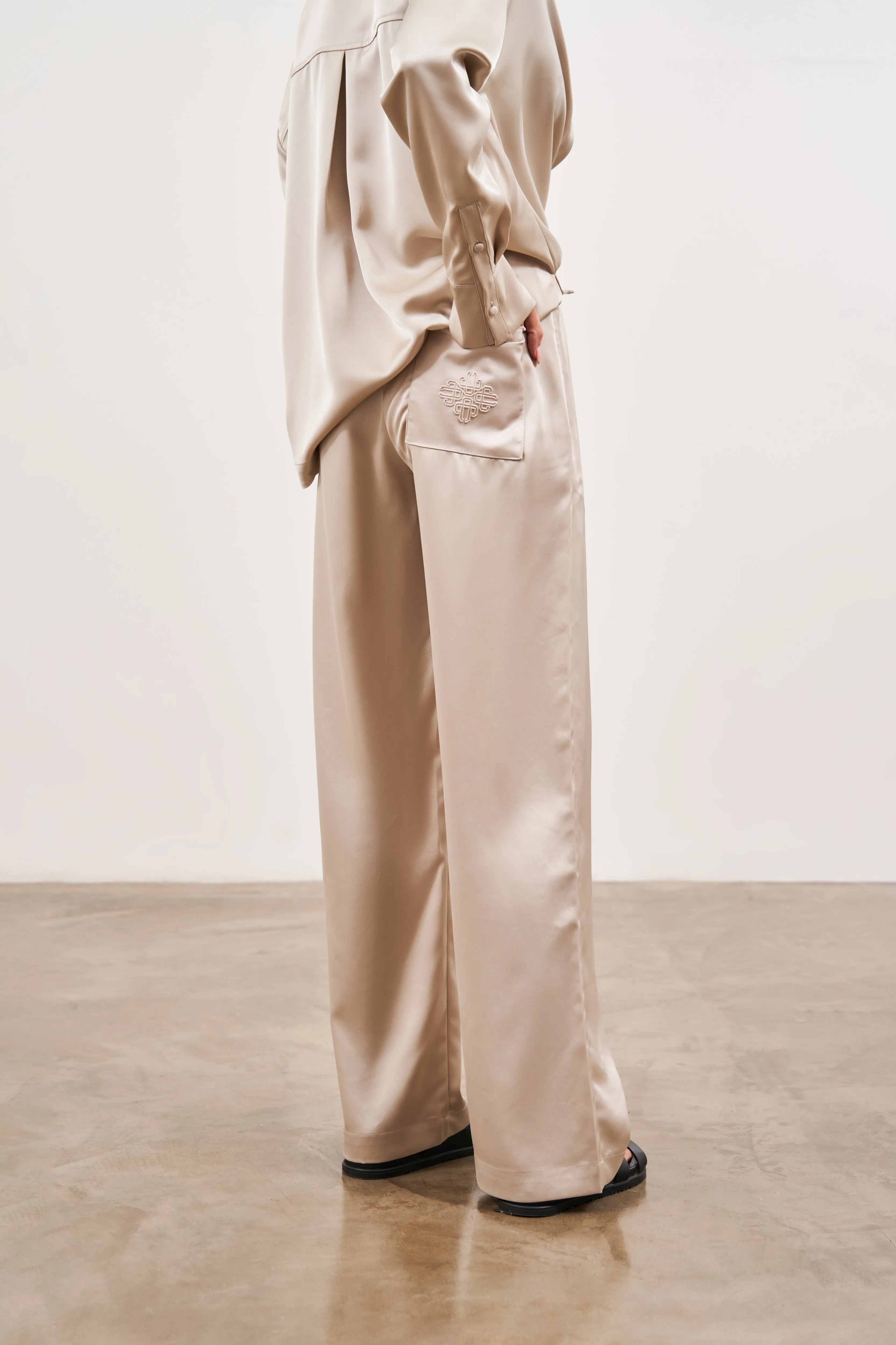 SATIN EMBLEM TROUSERS - BEIGE